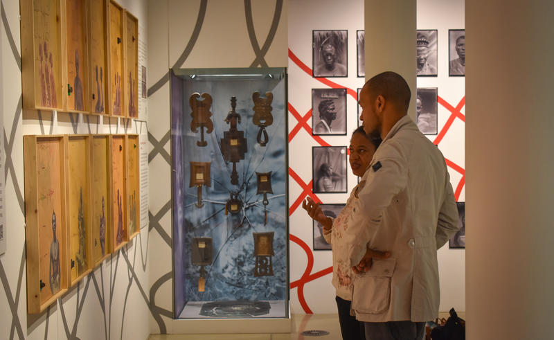 Re entanglements installation view a man and a woman looking at exhibition together